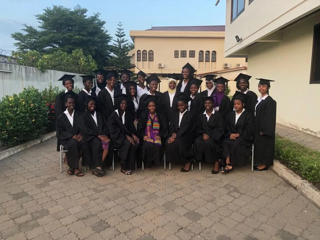An ASA graduating class portrait in caps and gowns