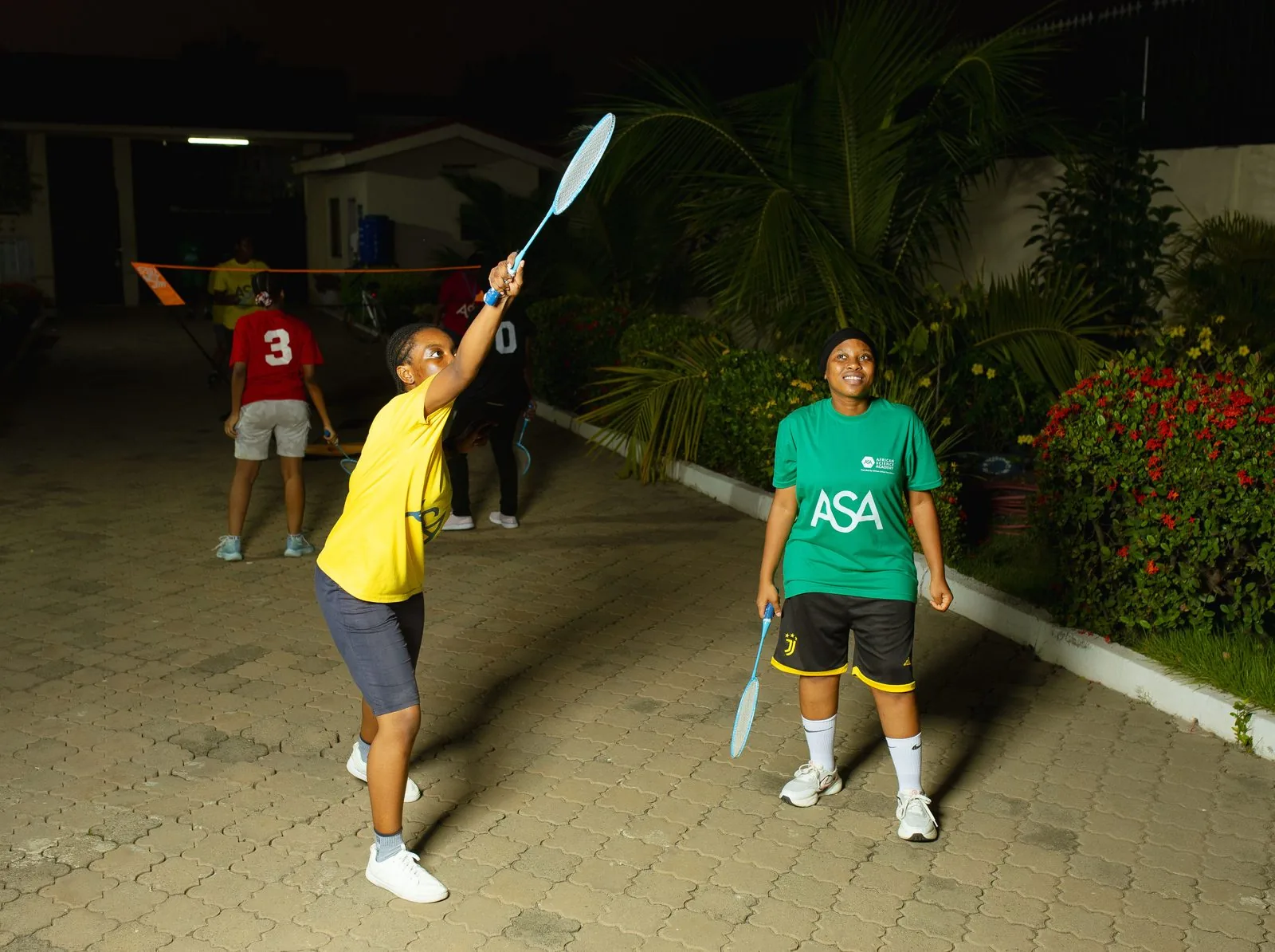 ASA students playing badminton on campus