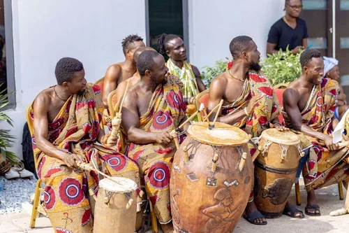 Traditional drummers performing in kente at an ASA event