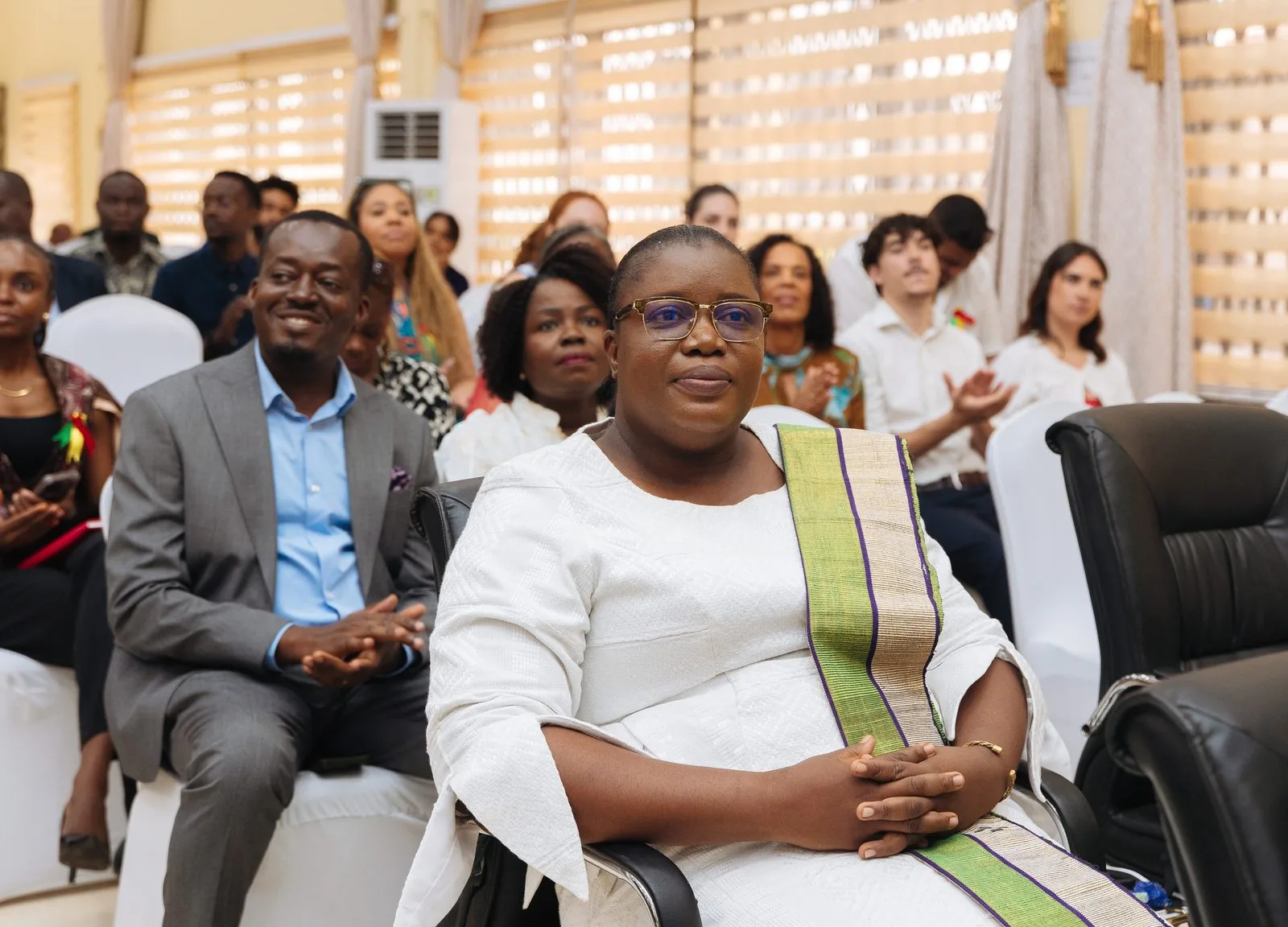 Head of School seated among the audience at an ASA event