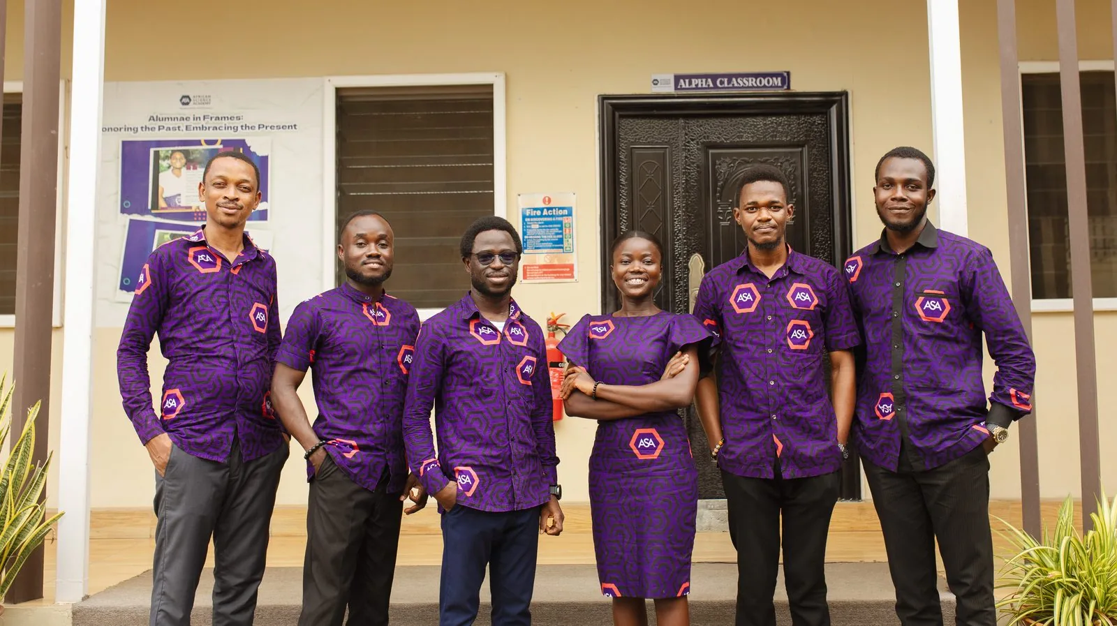ASA male teaching staff outside the Alpha Classroom
