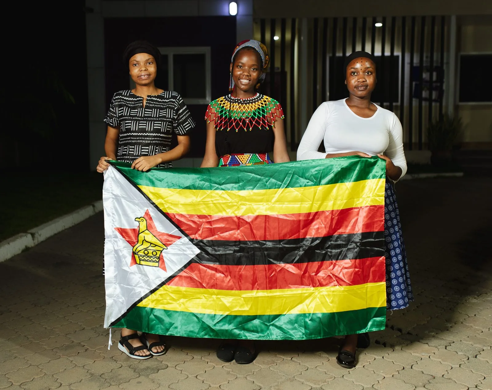 ASA students from Zimbabwe with their national flag
